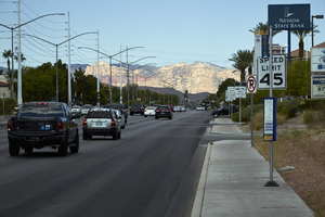 Red Rock Canyon behind West Sahara Avenue looking west, Las Vegas, Nevada: digital photograph