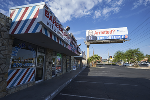 Barbarshop on strip mall on West Sahara Avenue at Richfield Boulevard looking west, Las Vegas, Nevada: digital photograph