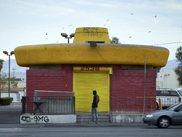 Skateboarder in front of El Pollo Mobile restaurant on South Arville Street looking west, Las Vegas, Nevada: digital photograph
