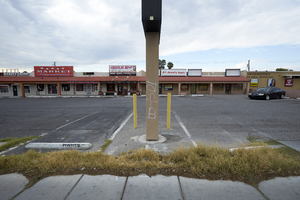 Strip mall parking on West Sahara Avenue looking south, Las Vegas, Nevada: digital photograph