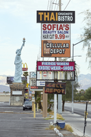 Signs along West Sahara Avenue east of South Arville Street looking west, Las Vegas, Nevada: digital photograph