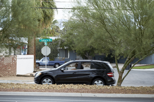 Cars travle past South Arenas Street and West Sahara Avenue looking north, Las Vegas, Nevada: digital photograph