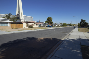 A home and the Stratosphere tower as seen from South Santa Clara Drive near East Sahara Avenue looking west, Las Vegas, Nevada: digital photograph