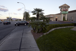 Sahara Towne Square on East Sahara Avenue at Maryland Parkway looking east at dusk, Las Vegas, Nevada: digital photograph