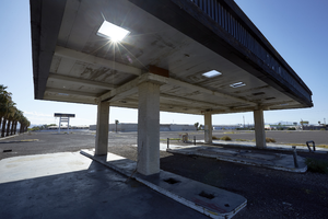 Vacant gas station at Crown Event Center commercial property on East Sahara Avenue at Boulder Highway looking east, Las Vegas, Nevada: digital photograph