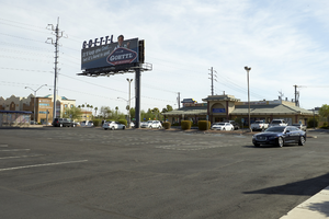 Parking lot and restaurant on West Sahara Avenue at Lindelll Road, looking northeast, Las Vegas, Nevada: digital photograph