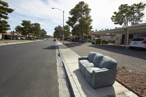 Abandoned couch on Eldora Court, looking south, Las Vegas, Nevada: digital photograph