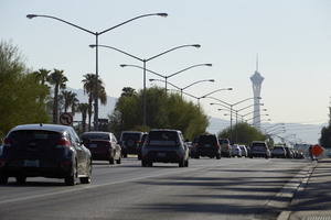 Bicyclist and cars on West Sahara Avenue east of Jones, looking east, Las Vegas, Nevada: digital photograph