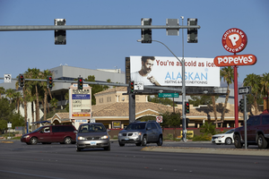 Intersection of Jones Boulevard and West Sahara Avenue with signs, looking northwest, Las Vegas, Nevada: digital photograph