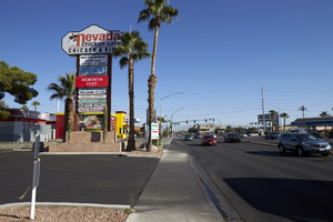 Traffic and signs on Jones Boulevard south of West Sahara Avenue, looking north, Las Vegas, Nevada: digital photograph