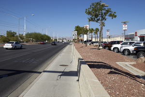 Traffic and an auto dealership on West Sahara Avenue east of Torrey Pines Drive, looking west, Las Vegas, Nevada: digital photograph