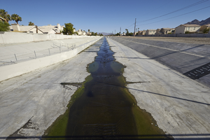 Single family homes along the Sloan Channel, looking north, Las Vegas, Nevada: digital photograph