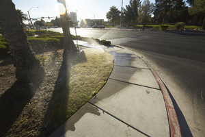 Sprinklers on West Sahara Avenue east of Grand Canyon Drive, looking east, Las Vegas, Nevada: digital photograph