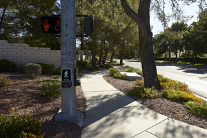 Sidewaks, traffic light, and landscaping on the corner of Fort Apache Road and Lake North Drive, looking east, Las Vegas, Nevada: digital photograph