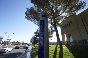 Bus sign and Starbucks Coffee east of West Sahara Avenue and Fort Apache Road, looking east, Las Vegas, Nevada: digital photograph