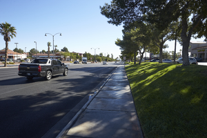 Landscaping and cars on West Sahara Avenue east of Fort Apache Road, looking northwest, Las Vegas, Nevada: digital photograph