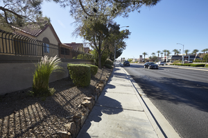 Landscaping for The Residence at Canyon Gate Apartments on Fort Apache Road north of West Sahara Avenue, looking south, Las Vegas, Nevada: digital photograph
