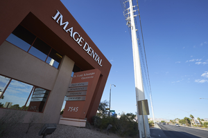 Businesses and power poles along West Sahara Avenue west of Tenaya Way, looking west, Las Vegas, Nevada: digital photograph