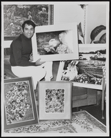 Vassili Sulich with his paintings, image 001: photographic print