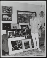 Two images of Vassili Sulich with paintings at his exhibition at the Tropicana Hotel: photographic print