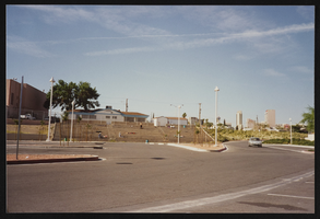 Homeless individuals on concrete bleachers at Las Vegas library: photographic print
