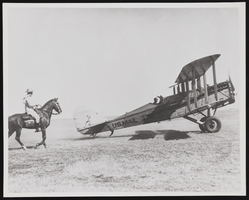 U.S. mail airplane and horse with rider: black-and-white photographs