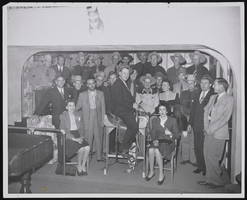 Party for Glen Jones (seated on saddle), his deputies, and office staff: photographic print