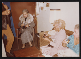 Alice Key sitting on a couch with several unidentified women backstage in Los Angeles, California: photographic print
