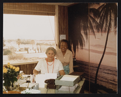 Alice Key (front) and unidentified woman at a birthday party: photographic print