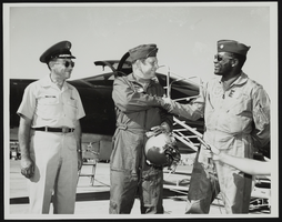 Lieutenant Colonel Randall and Major General R. G. Taylor with Howard Cannon at Nellis Airforce Base: photographic print