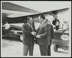Howard Cannon receives congratulations from W. E. Carson (Nevada Director of Economic Development): photographic print