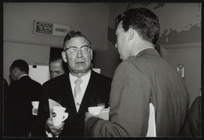 Men at a conference at Air Force Ballistic Missile Headquarters: photographic print