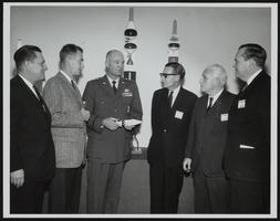 Lieutenant General Howell M. Estes briefs Senators Howard Cannon, Clifford P. Case, Winston L. Prouty, and Thomas J. Dodd along with Carter W. Bradley: photographic print