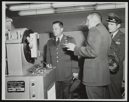 Howard Cannon during visit to Holloman Air Force Base, New Mexico with two other men: photographic print