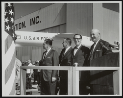 Howard Cannon pictured with an unidentified group: photographic print