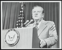 Howard Cannon is pictured at the rostrum with the seal of the Vice-President of the United States: photographic print