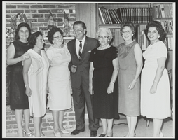 Howard and Dorothy Cannon gather with a group of women: photographic print
