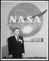 Howard Cannon in front of National Aeronautics and Space Administration Control Center at Patrick Air Force Base, Florida: photographic print