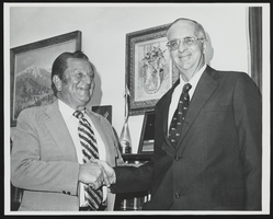 Howard Cannon pictured shaking hands with Paul Volcker: photographic print