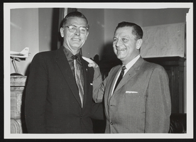 Howard Cannon posed with an unidentified man: photographic print