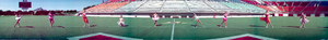 Ballerinas posing on Las Vegas Silver Bowl field, Las Vegas, Nevada: panoramic photograph