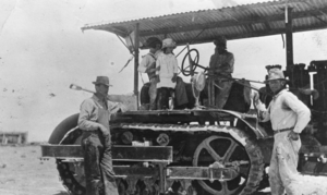 Gasoline tractor operated by Dave Fairbanks to haul gold ore from a mine in Death Valley, California: photographic print
