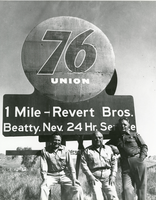 Dolf Goole works on the first street light in Beatty, Nevada: photographic print