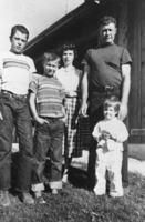 Norman "Curly" Coombs with family: photographic print