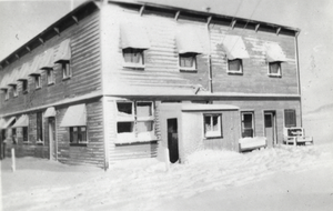 Round Mountain Hotel and snow drifts: photographic print