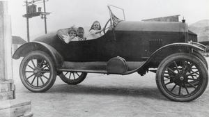 Lucille Berg, and Dan and Getta Berg (identified from left to right) in a car: photographic print