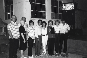 Family at a gathering in recognition of Rene Zaval's 25 years of service at Carver's Station: photographic print