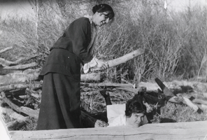 Lillian Yeager Berg pretending she is going to hit her aunt, Katie Rogers Berg, wife of Karl Berg, in a bit of horseplay: photographic print
