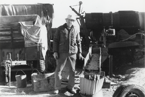 Robert "Bob" Wilson running his placer mill at Ophir Canyon, Toiyabe Mountains, Nevada: photographic print