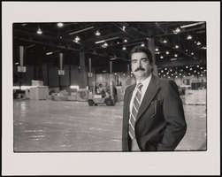 Fernando Perez, Sales Manager for Las Vegas Convention Center, stands inside an empty hall at the Las Vegas Convention Center: black-and-white photographs